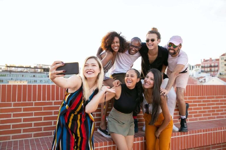 A group of friends taking a photo on a tour